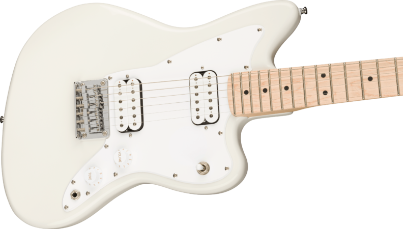 a white guitar with strings