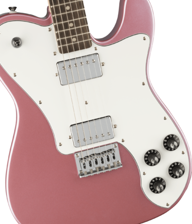 a pink electric guitar