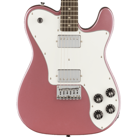 a pink electric guitar