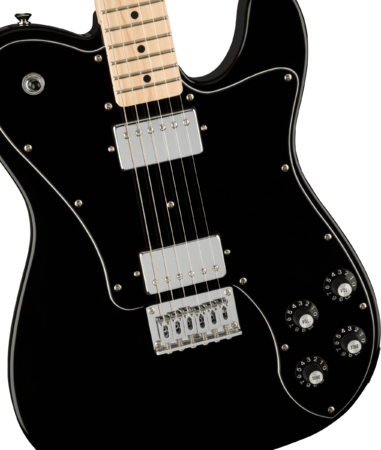 a guitar on a black background