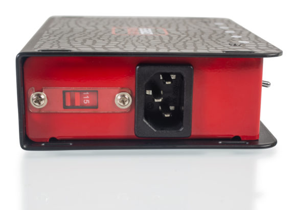 a red rectangular object with a dial