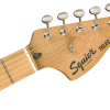 0374060505_gtr_hdstckfrt_001_nr a close up of a guitar