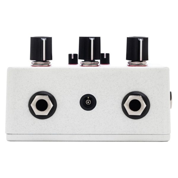 a white rectangular object with black buttons