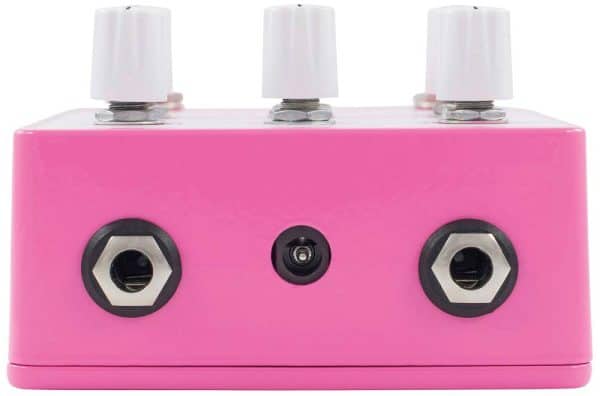 a pink and white object with buttons