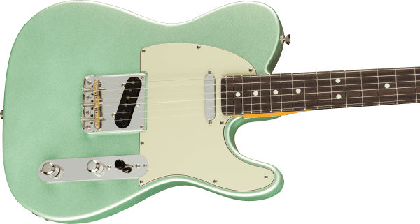a green electric guitar