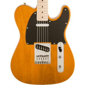 a brown acoustic guitar