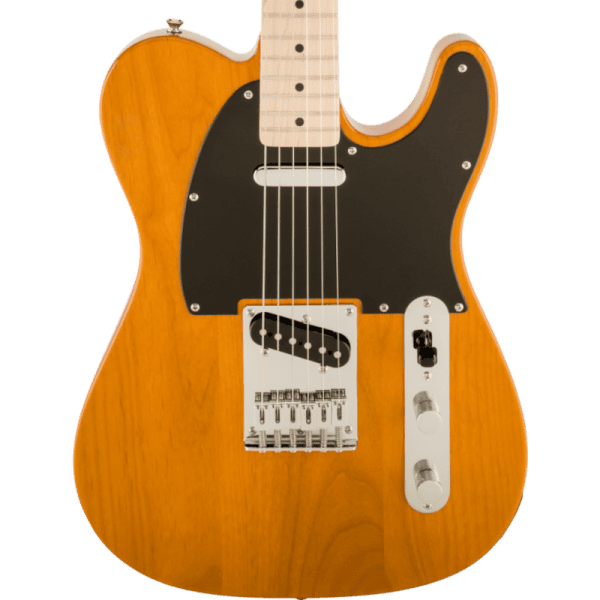 a brown acoustic guitar