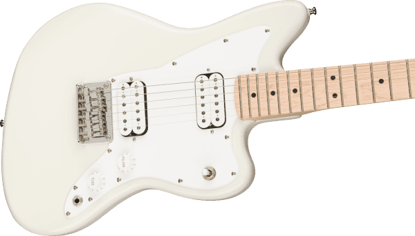 a white guitar with strings