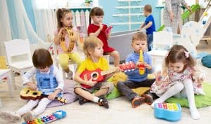 Kids learning musical instruments during music summer camp in Omaha and Lincoln, NE.